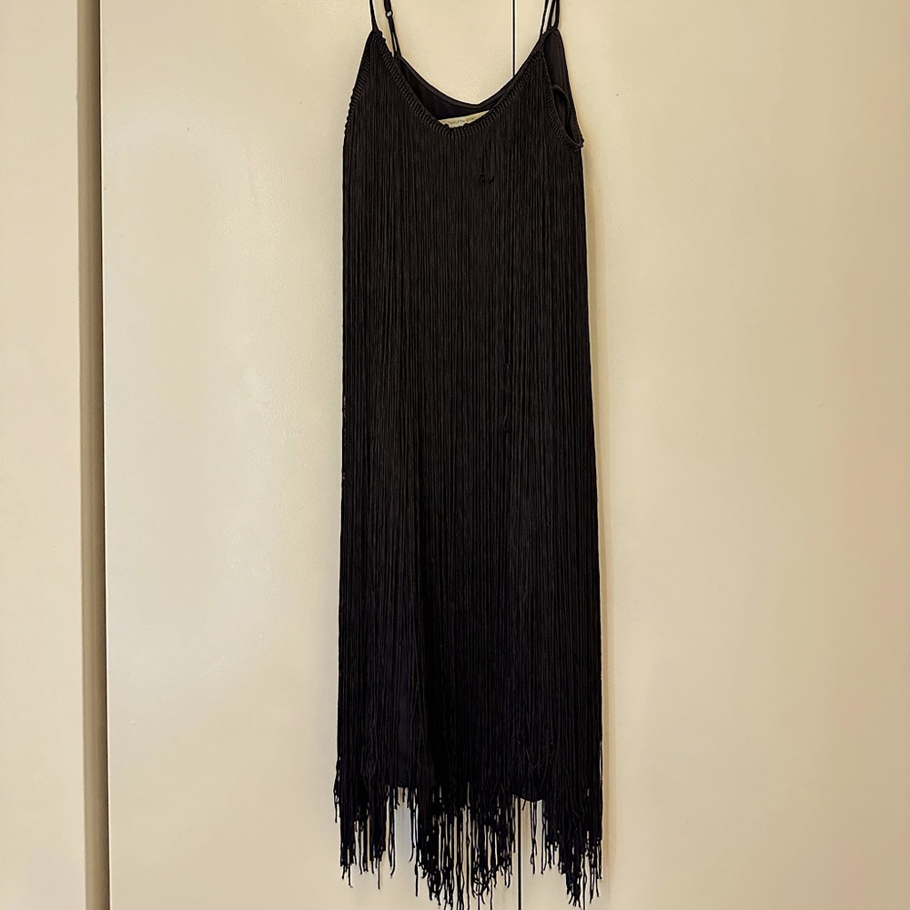 Adorable black silk tassel dress.